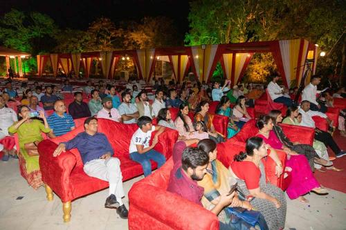 Audience watching play on Maharana Pratap 